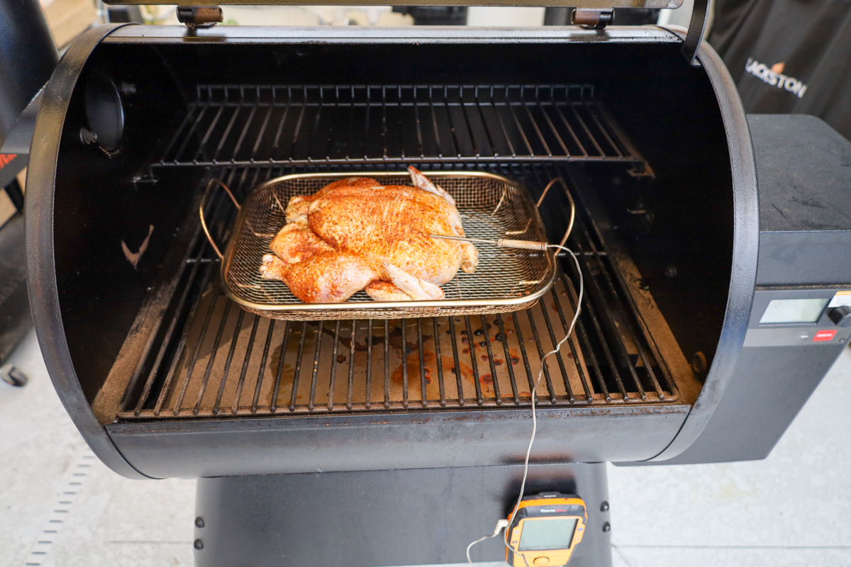 Chicken placed in the smoker, ready to absorb that delicious, smoky goodness.